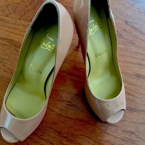 Tan high heel Louboutins
